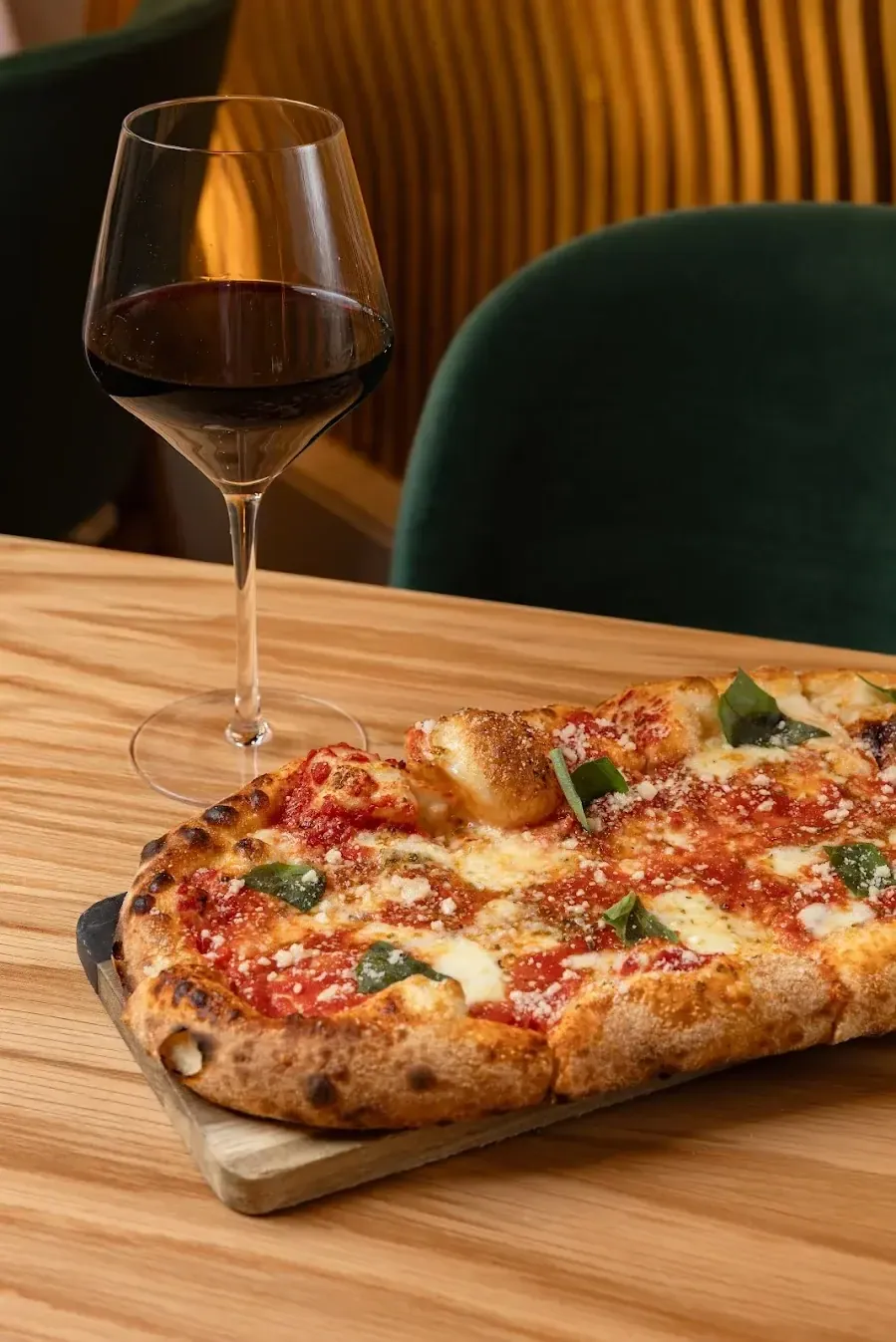 A slab of Roman-style pizza on a board