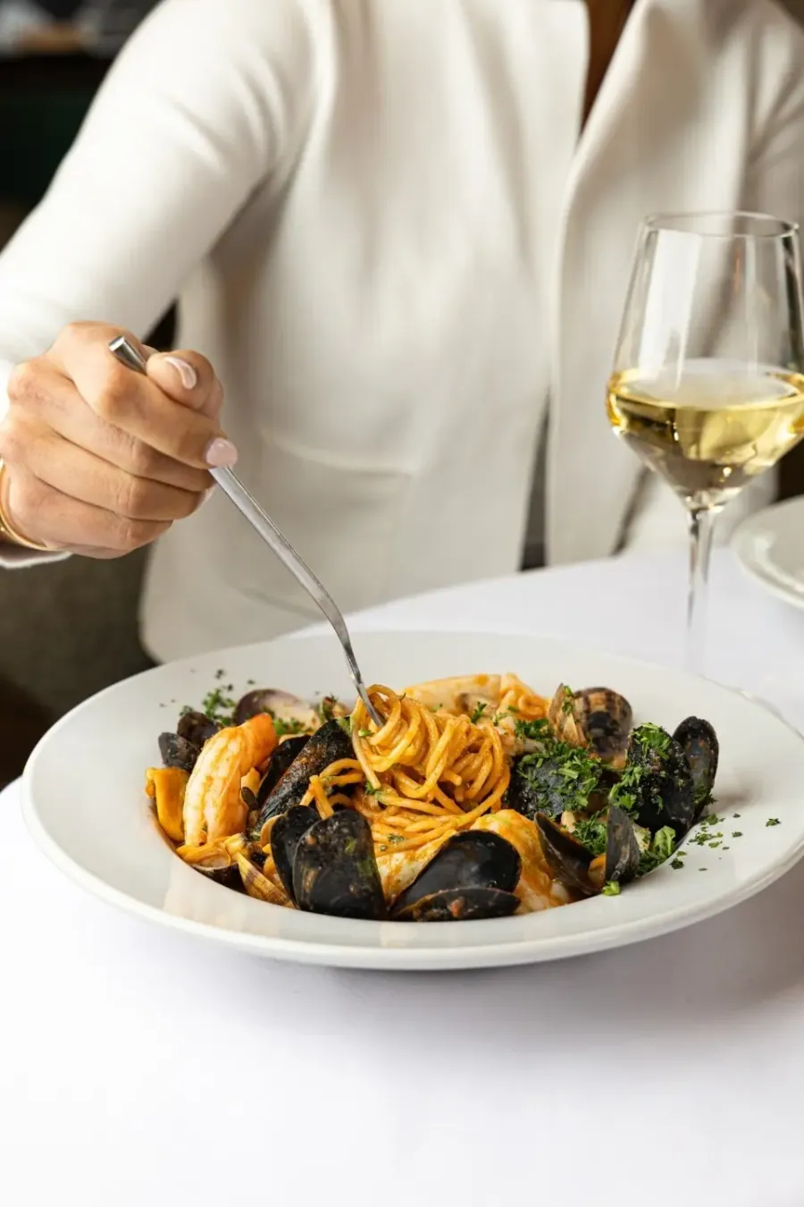 A bowl of frutti di mare with fresh pasta